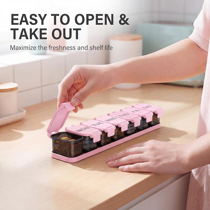 Yaklim Extra Large Weekly Pill Organizer - Waterproof 7-Day Pill Box, Portable Vitamin & Supplement Case, Easy to Open Design, Ideal for Travel and Daily Medication Management (Blackpink)