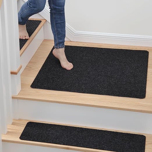 MBIGM Carpet Stair Landing Mat, 1 Pack, 2'6" x 2'6", Black | Polyester carpet surface with PP mesh, nonwoven cushioning, and TPR adhesive backing for indoor stair coverage.