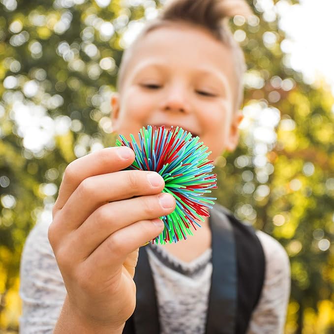 Leinuosen 12 Pieces Stringy Balls Sensory Stringy Ball Soft Rainbow Pom Bouncy Stress Bags Stocking Stuffers Party Favors Birthday Gifts, Multicolor (2.75 Inch)