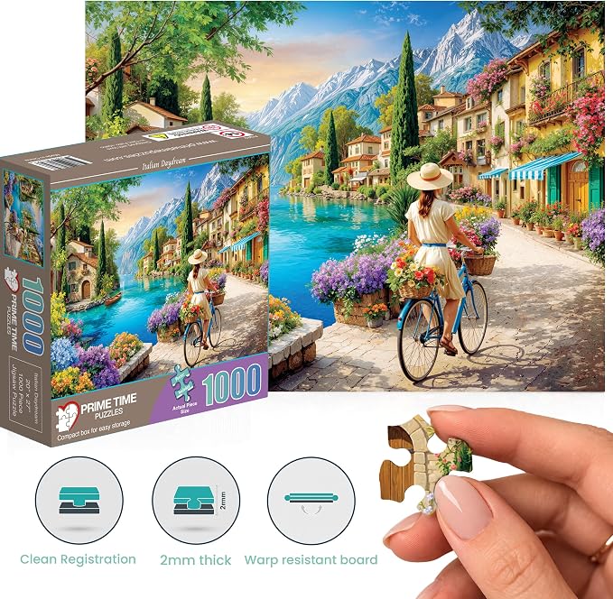 Adult Jigsaw Puzzle 1000 Piece Italian Daydream | Features a woman on a bicycle along the Mediterranean coast in Italy. Finished size is 20x27 inches. Great for game nights.